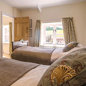  Each room in the cottage contains the beautiful Welsh blankets and textiles made by Nicola Daley from the wool from Beili Glas